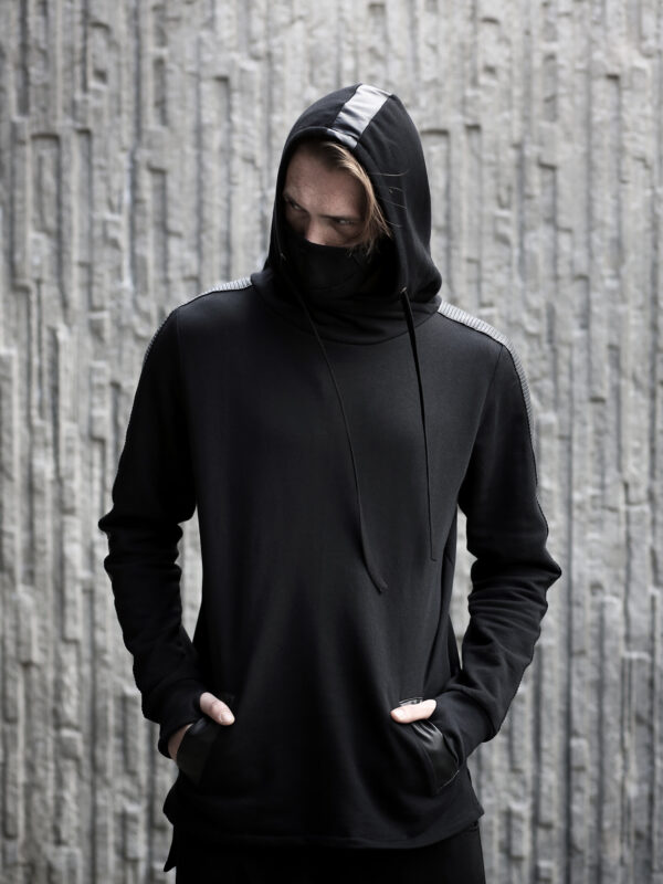 Black cotton hoodie designed with vegan leather stripes.